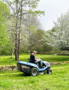 Mowing the beautiful new lawn